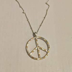 Silver Peace sign necklace with yellow gems